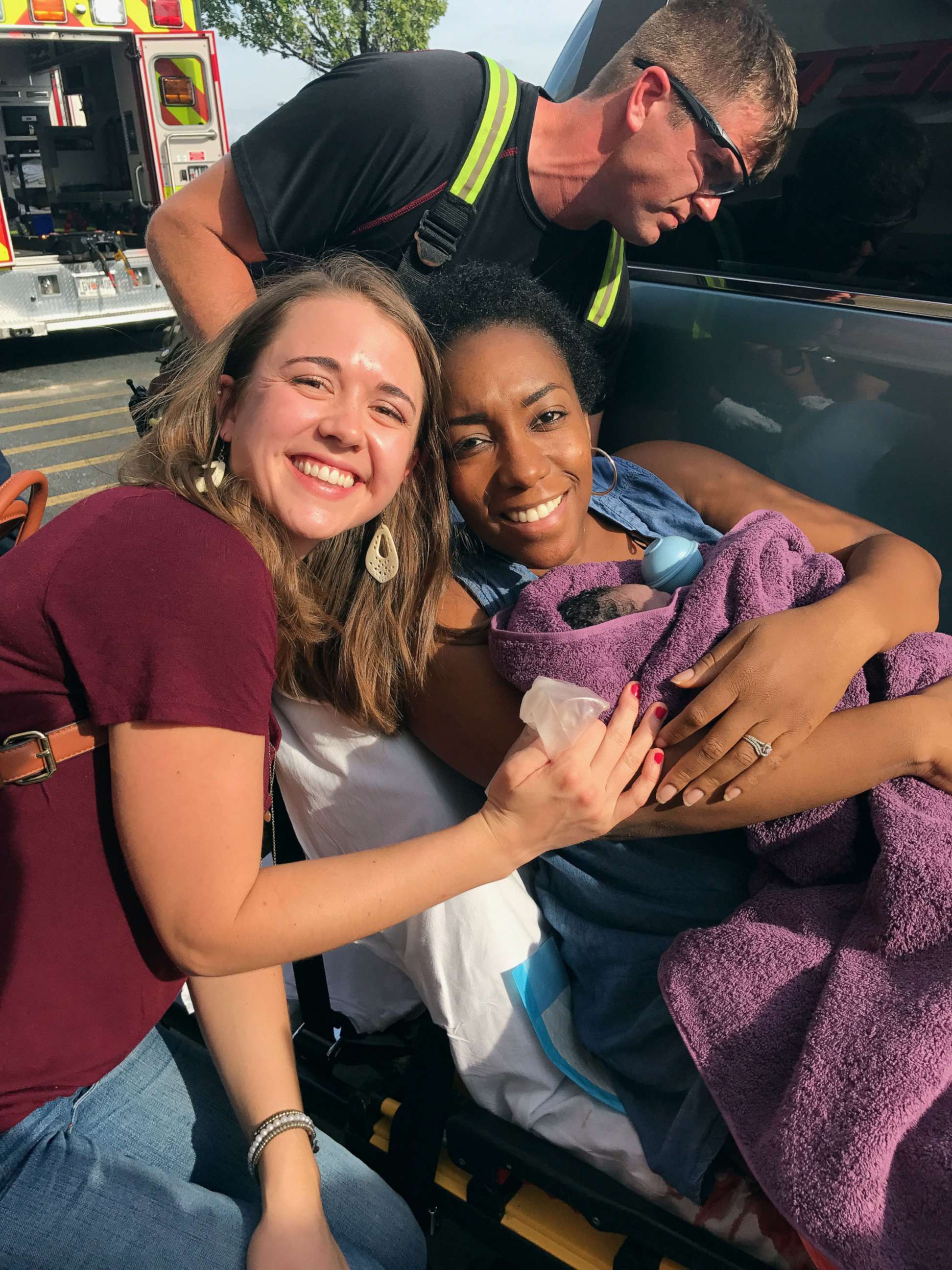 PHOTO: Caris Lockwood, 24, a labor nad delivery nurse from Atlanta, Georgia, delivered the baby boy of Tanya Saint Preux Picault on Aug. 25 outside the entrance of a Target store near the Mall of Georgia in Buford, Georgia. 