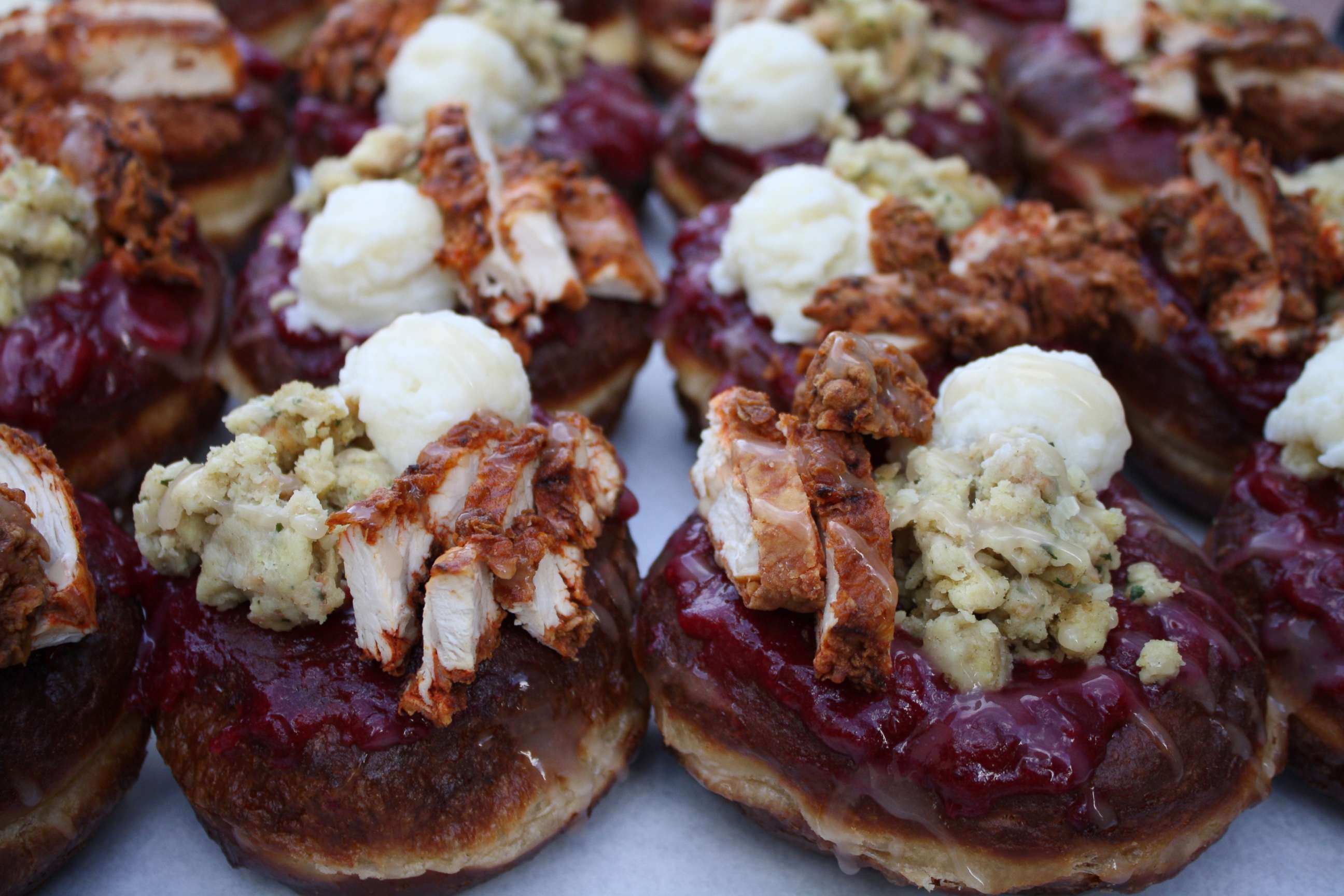 PHOTO: The donut features cranberry glaze, fried chicken, mashed potatoes, gravy and stuffing.