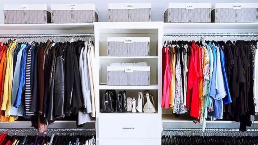 PHOTO: Clothes sorted by color hang in a closet organized by The Home Edit.