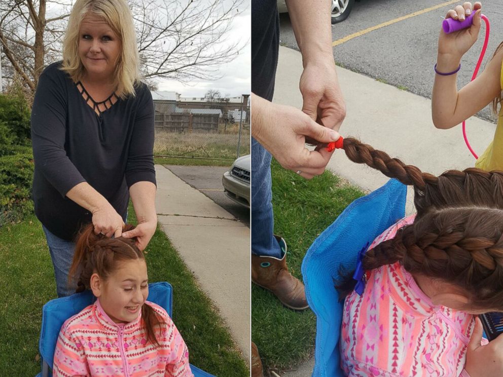 PHOTO: Tracy Dean, 47, who has been driving the bus at Alpine School District in Utah for 10 years now, braids 11-year-old Isabella Pieri's hair each day before school.