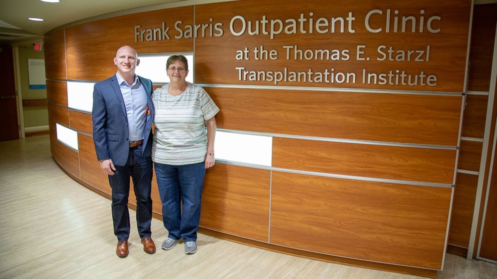 PHOTO: A year after their living donor liver transplant, Brian and Diane Muscarella catch up with their surgeon, UPMC's Dr. Abhi Humar.
