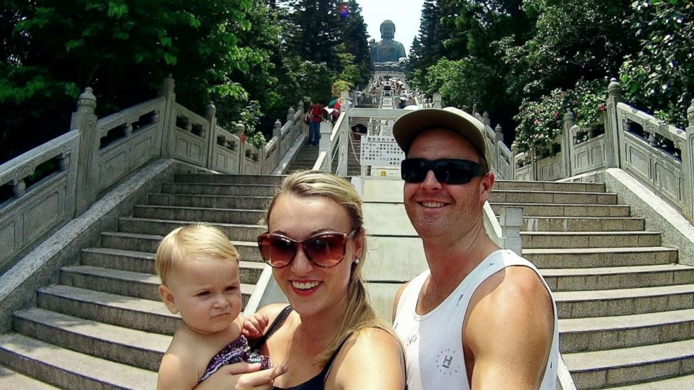 PHOTO: Karen Edwards and Shaun Bayes pose with their daughter, Esme, during Edwards’s first maternity leave.
					