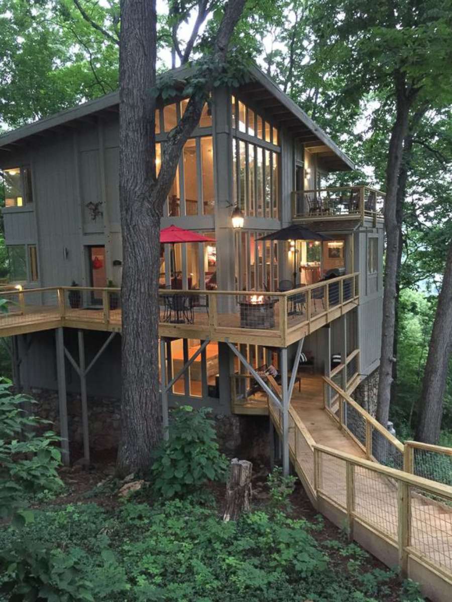 PHOTO: This upscale 6 bedroom treehouse is tucked in the mountains of Asheville, North Carolina.