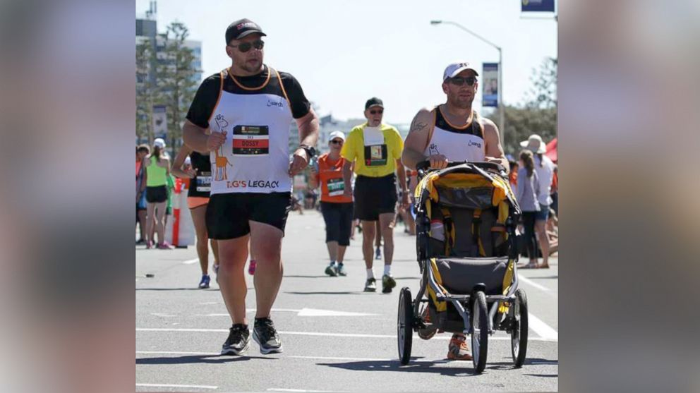 Troy Austin lost his infant son and pushed his empty stroller through a marathon to raise awareness. 