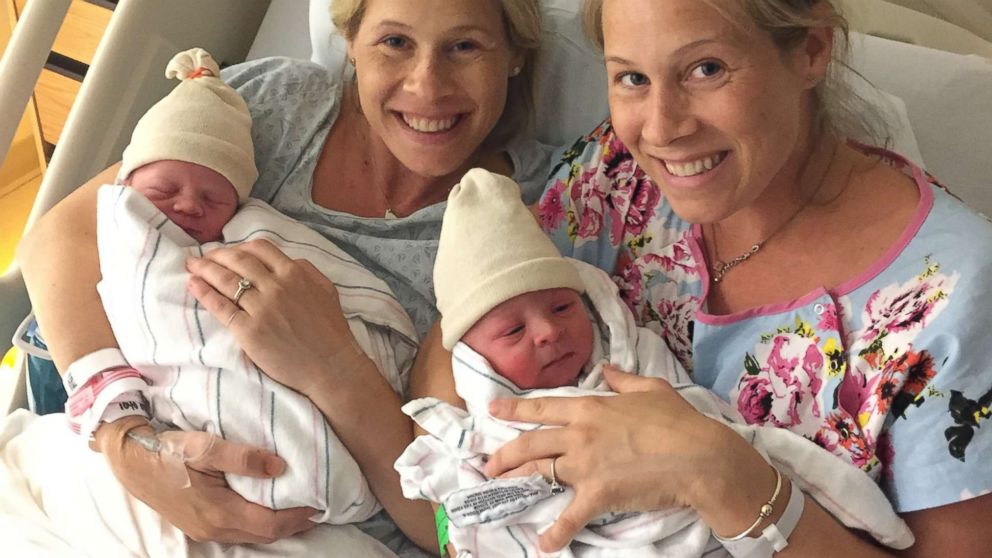 PHOTO: Becky Pistone (left) holds her daughter Andi at Mount Auburn Hospital in Cambridge, Massachusetts, next to her identical twin sister, Rachael McGeoch, who holds her son, William. 