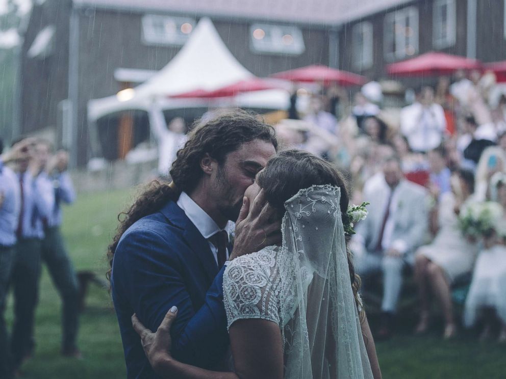 Bride and groom create epic music video in the pouring