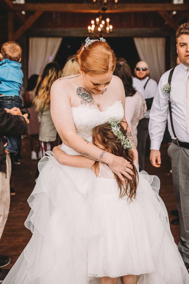 PHOTO: Jenni Gibson dances with her daughter Lexi during her May 12 wedding reception.