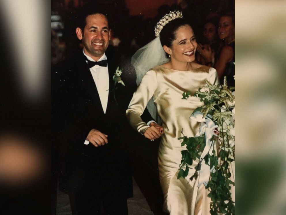 PHOTO: Elena Salinas and Ric Salinas walk down the aisle on their wedding day in 1997.