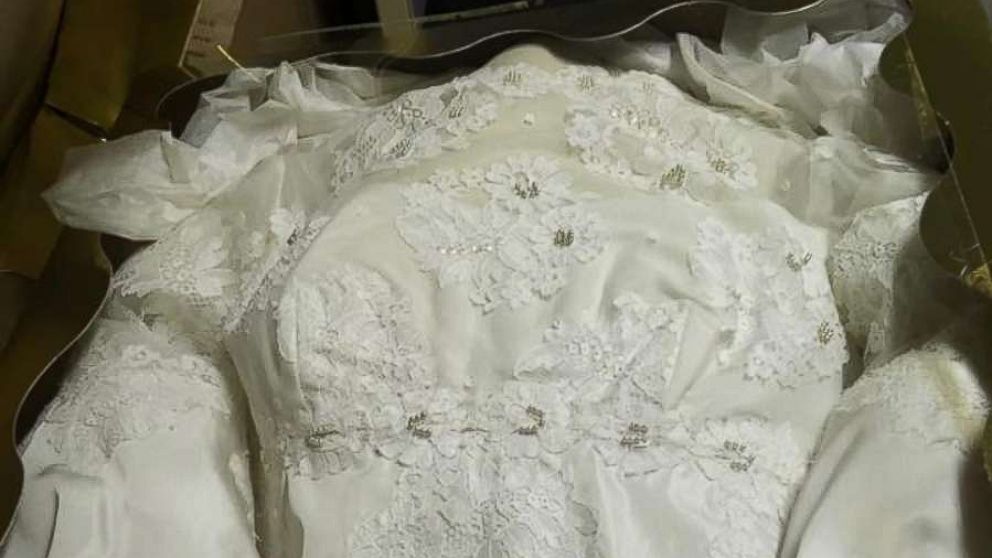 Woman reunited with her mother's lost wedding dress found in attic ...