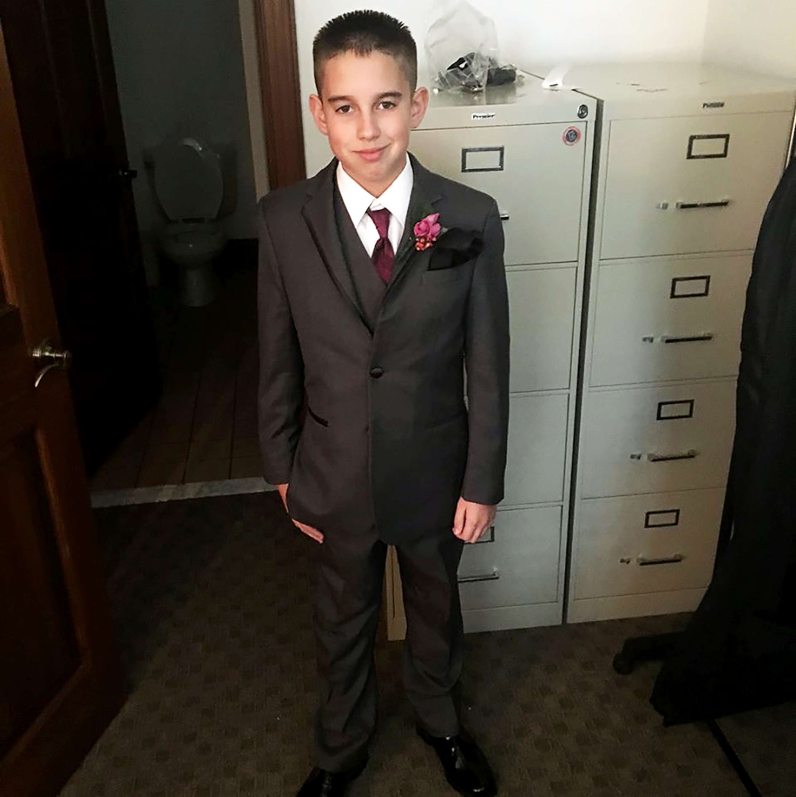 PHOTO: Jaydon Rabatin poses in his suit as the best man for his dad's Nov. 12 wedding.