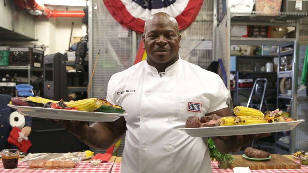 White House chef Andre Rush flexes his viral biceps for veterans this Fourth of July and dishes up some of his favorite dishes on the grill.