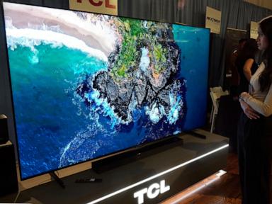 A TV as big as a bed? With the holidays approaching, stores stock more supersize sets