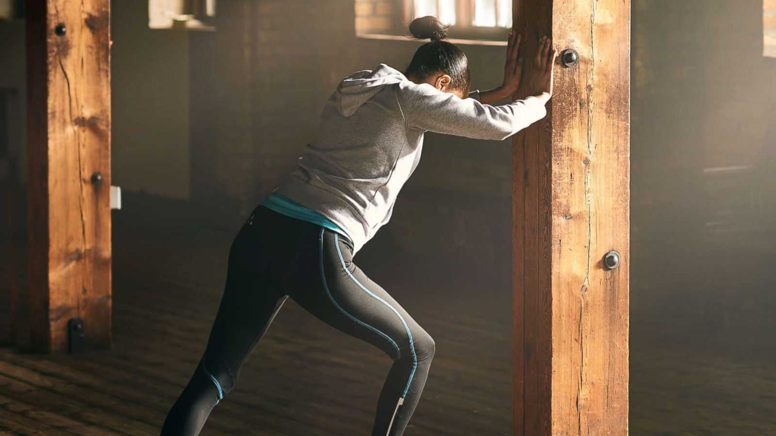 PHOTO: A woman stretches at a gym in this stock photo.