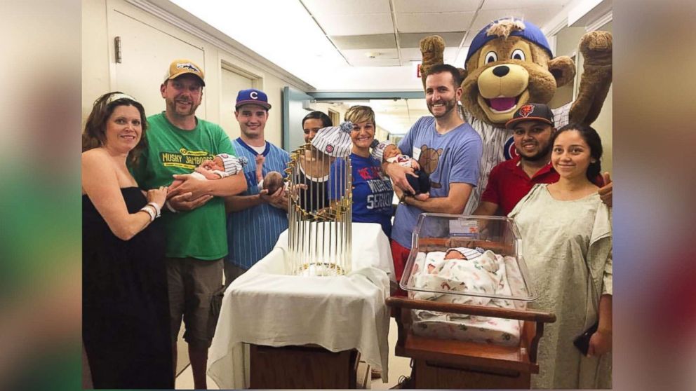 VIDEO: Advocate Illinois Masonic Medical Center celebrated the newborn Cubs fans with team onesies and photos with the trophy and team mascot.