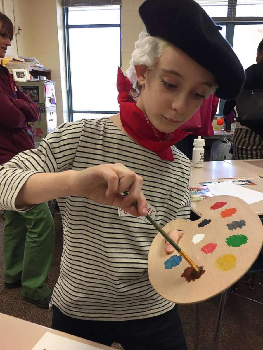 PHOTO: Geroge Yionoulis, 9, practicing his painting in class.