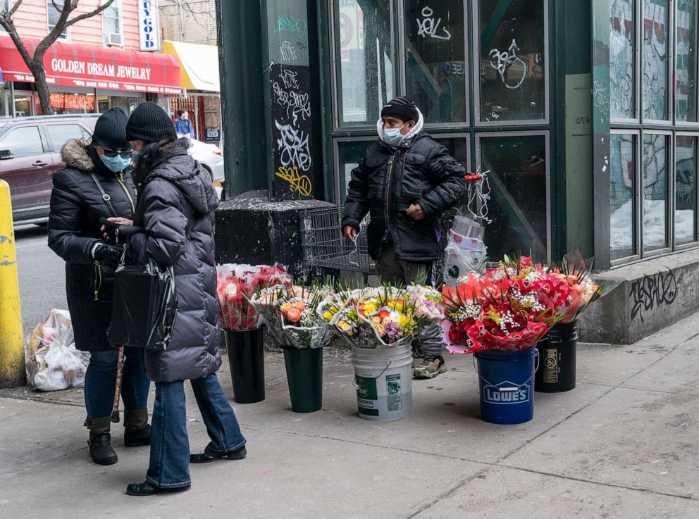 PHOTO: A vendor sells flowers for Valentines Day on the street in Kingsbridge section of the Bronx in New York on Feb. 13, 2021.