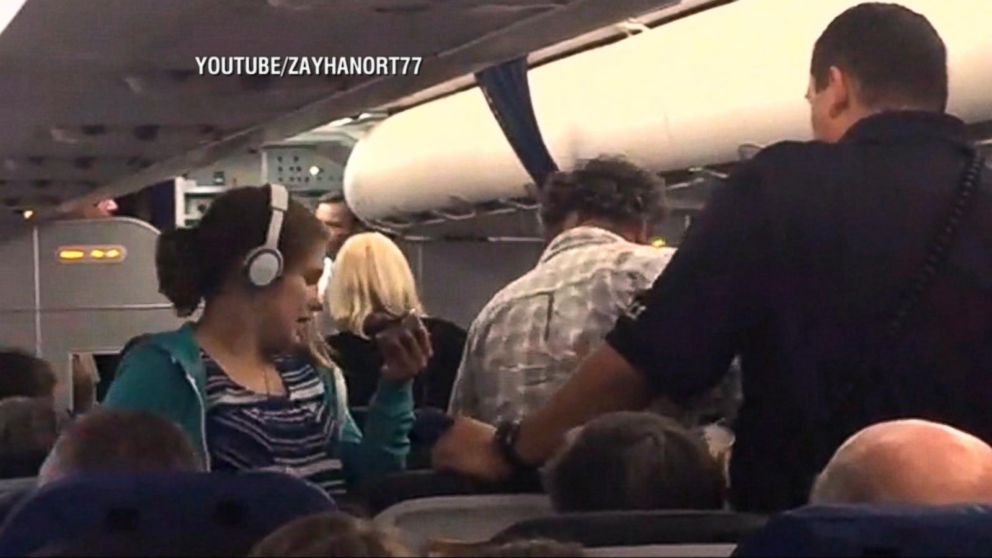 Woman Claims She and Daughter With Autism Were Kicked Off United Airlines  Flight - ABC News