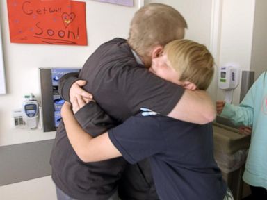 VIDEO: In an emotional reunion, Hardison's five children see their dad for the first time two months after the surgery. 