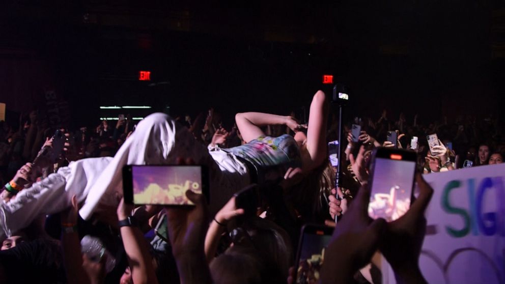 PHOTO: Popstar FLETCHER crowd-surfs during a performance at Webster Hall in New York City in April 2022