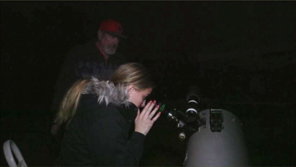 PHOTO: Heather Hodlin sees stars for the first time while peering through a telescope in February 2019.