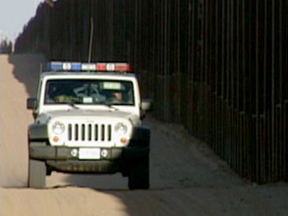 Mexican Police stop the violence spilling over the border.