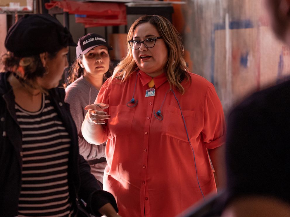 PHOTO: Creator and Showrunner Tanya Saracho works with members of the cast and crew of the Starz show, Vida.
