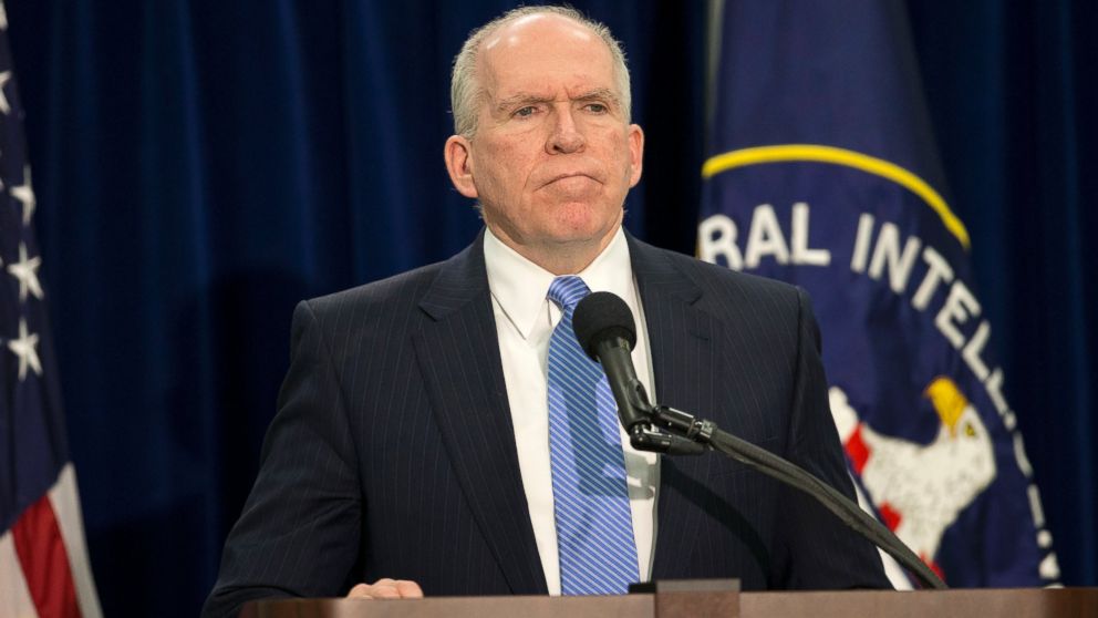CIA Director John Brennan pauses during a news conference at CIA headquarters in Langley, Va., Dec. 11, 2014. 