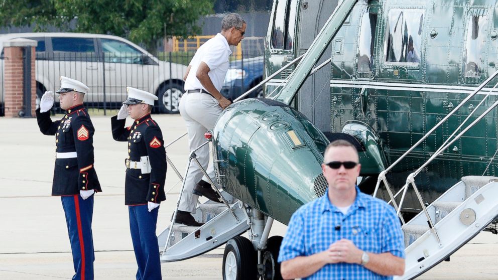 PHOTO: President Barack Obama boards Marine One at Joint Base Andrews, Aug. 1, 2015 in Maryland. 