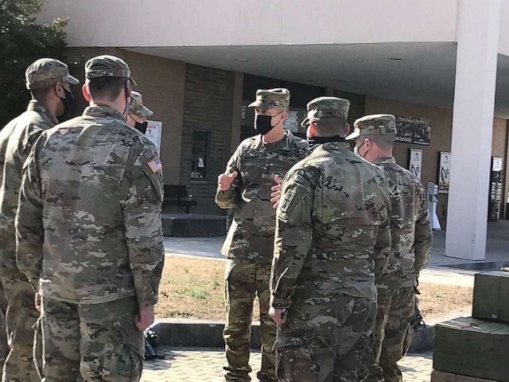 PHOTO:  Daniel Hokanson, the Chief of the National Guard Bureau, greets Guardsmen from the Wisconsin National Guard at Joint Base Andrews, Maryland, Jan. 16, 2021.