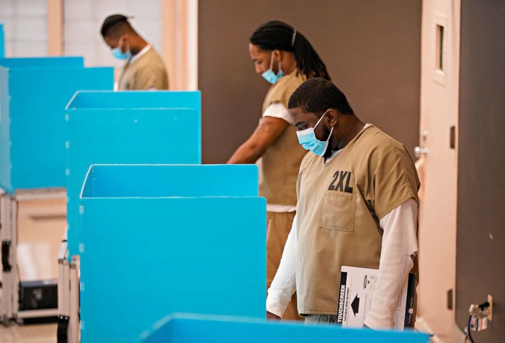 PHOTO: Cook County jail detainees cast their votes after a polling place in the facility was opened for early voting on Oct. 17, 2020 in Chicago.