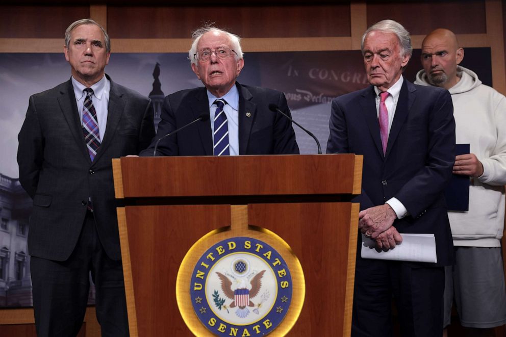 PHOTO: U.S. Sen. Bernie Sanders (I-VT) speaks as (L-R) Sen. Jeff Merkley (D-OR), Sen. Ed Markey (D-MA), and Sen. John Fetterman (D-PA) listen during a news conference on debt limit at the U.S. Capitol, May 18, 2023, in Washington.