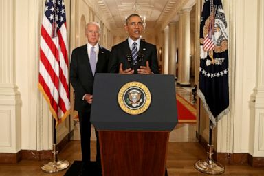 PHOTO: President Barack Obama, standing with Vice President Joe Biden, conducts a press conference in the East Room of the White House in response to the Iran Nuclear Deal, on July 14, 2015 in Washington, DC.