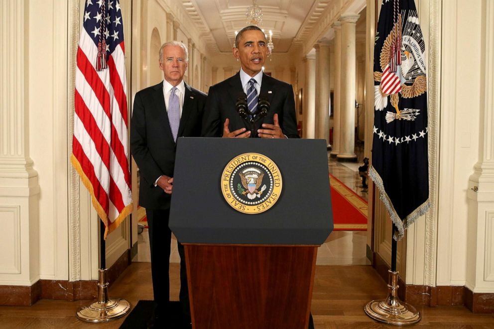 PHOTO: President Barack Obama, standing with Vice President Joe Biden, conducts a press conference in the East Room of the White House in response to the Iran Nuclear Deal, on July 14, 2015 in Washington, DC. 