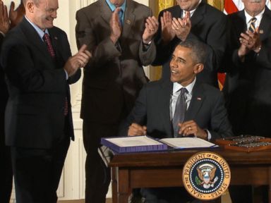 VIDEO: Obama Signs Fast-Track Trade Bill