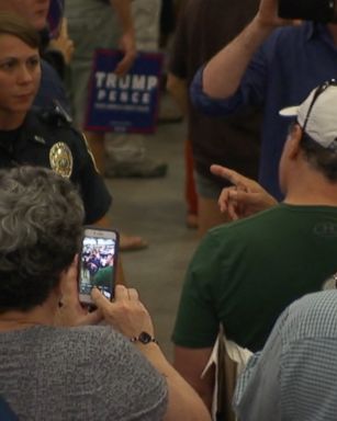 Trump supporter gets escorted out of the Trump rally in North Carolina.