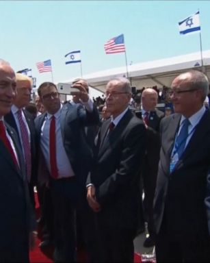 Israeli lawmaker Oren Hazan took out his phone to try to take a selfie with President Donald Trump, but only until Israeli Prime Minister Benjamin Netanyahu tried unsuccessfully to push Hazan's arm aside.