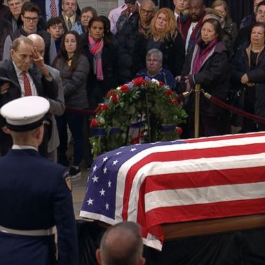 The former senator stopped by the Capitol Rotunda to pay his respects to the late president.