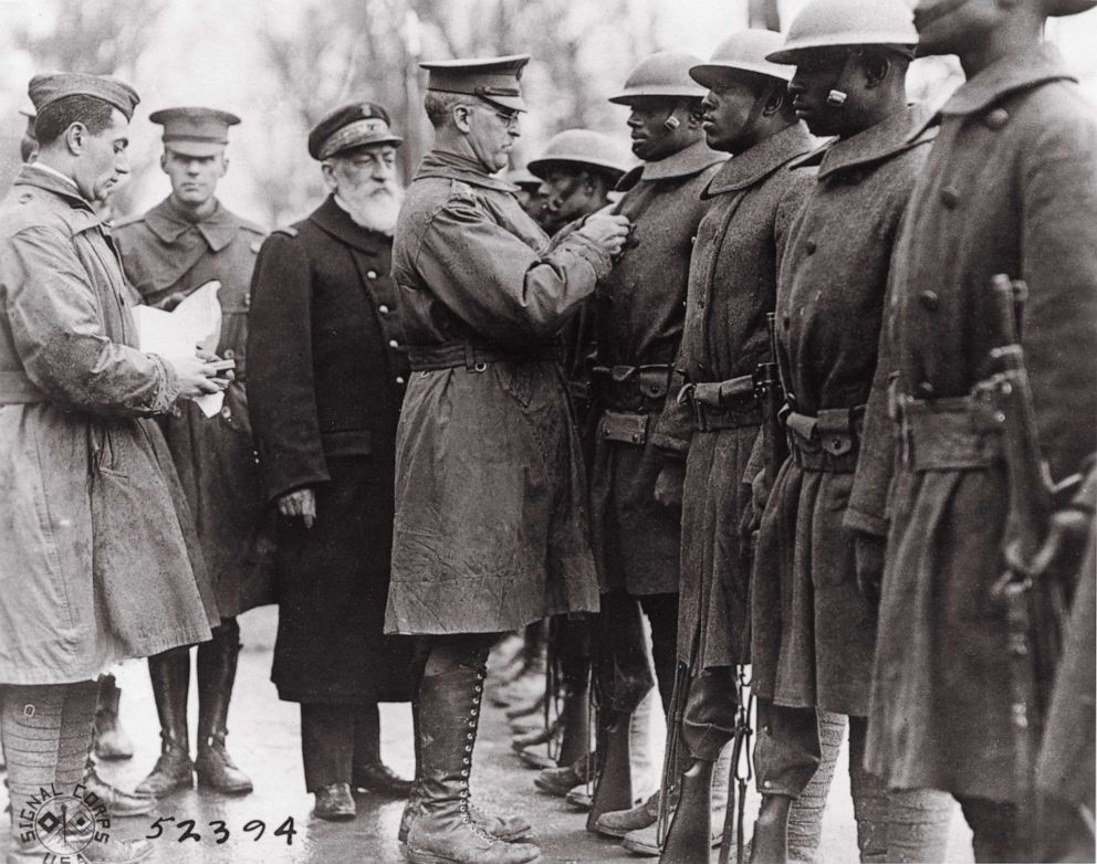 PHOTO: Soldiers of the 369th Regiment receive medals awarded to them by France for their valor in battle along the French Army in World War I. 