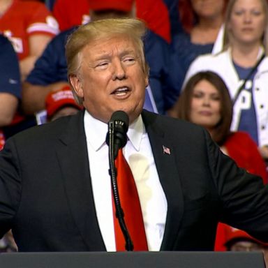 The president embraced the initial findings by the attorney general of Robert Mueller's report during a campaign rally in Grand Rapids, Michigan.