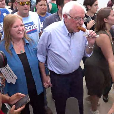 PHOTO: The Democratic presidential candidate was swarmed by press at the Iowa State Fair.