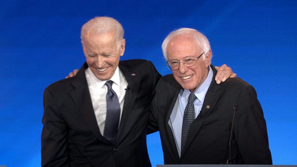 Biden Hugs Sanders After Moderator Says Clinton Suggests Nobody Likes The Senator Abc News 