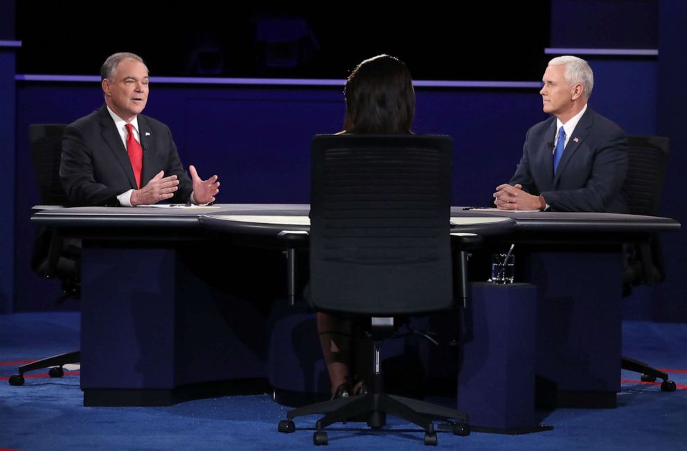 PHOTO: Democratic vice presidential nominee Tim Kaine, left, speaks as Republican vice presidential nominee Mike Pence and debate moderator Elaine Quijano listen during the Vice Presidential Debate, Oct. 4, 2016, in Farmville, Virginia.