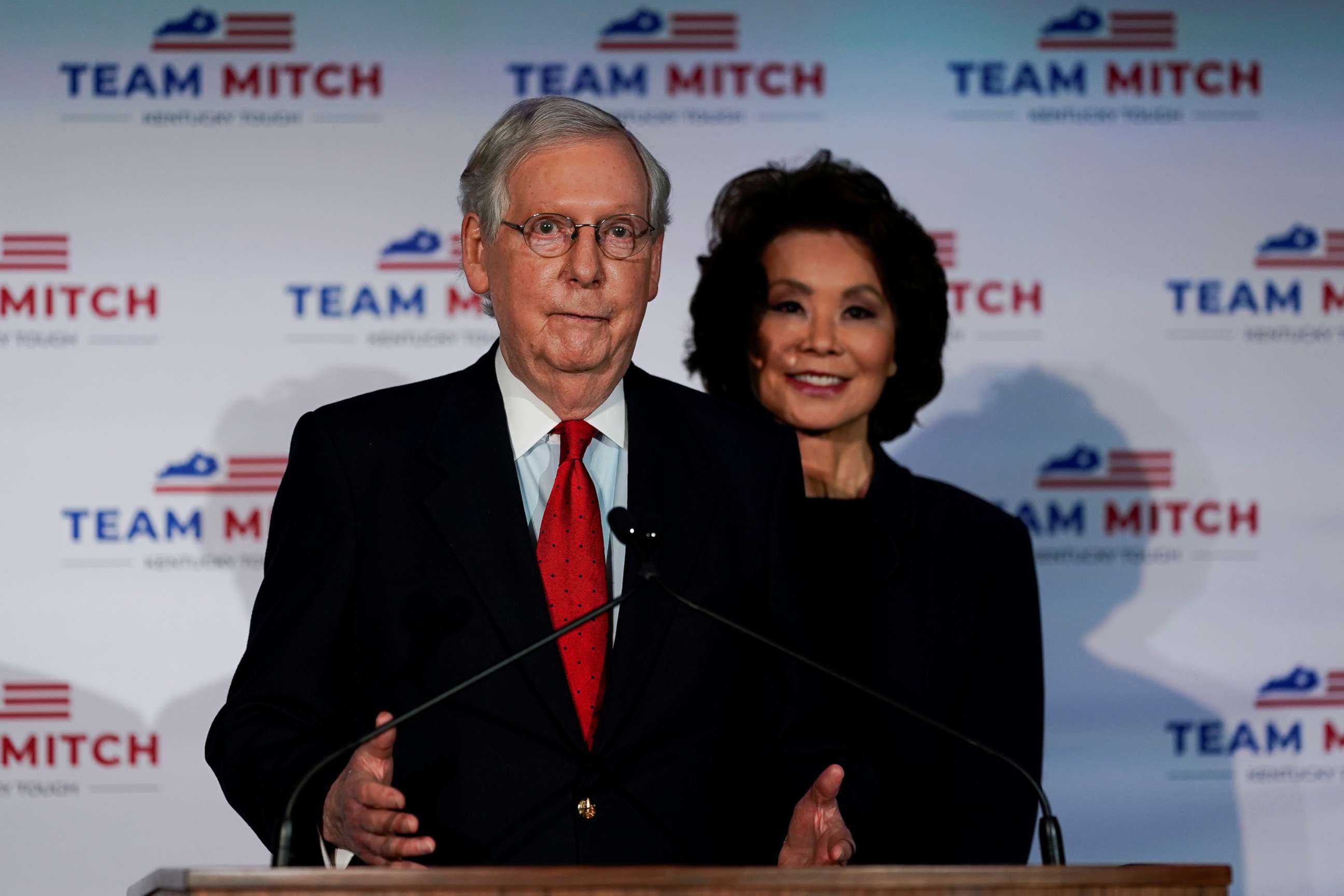 PHOTO: Senate Majority Leader Mitch McConnell, accompanied by his wife, Secretary of Transportation Elaine Chao, holds a post election news conference as he declares victory, in Louisville, Ky., Nov. 3, 2020.