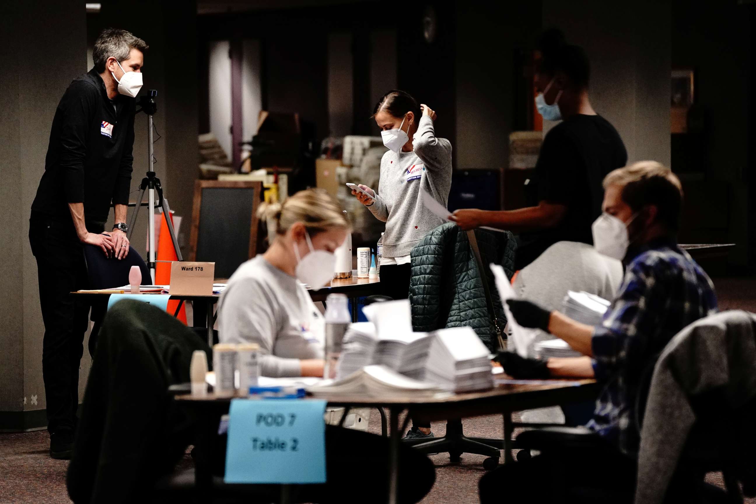 PHOTO: Poll workers process absentee ballots the night of election day at Milwaukee Central Count in Milwaukee, Nov. 3, 2020.