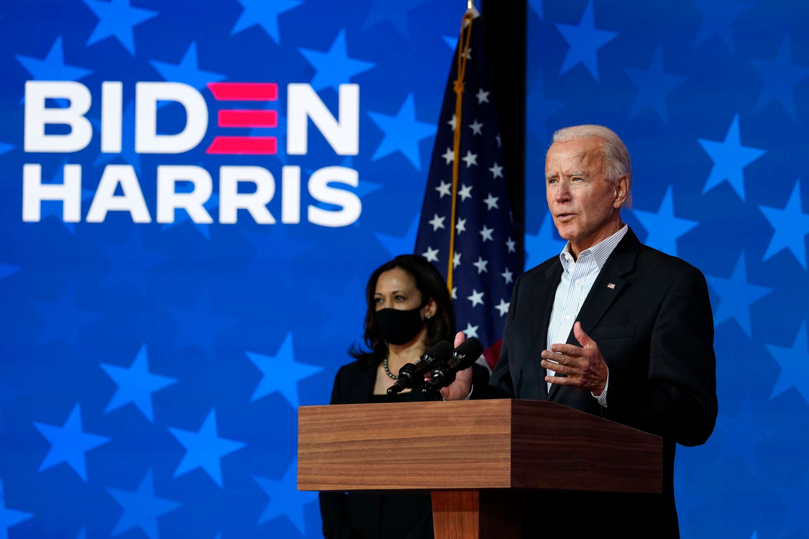 PHOTO: Democratic presidential candidate Joe Biden speaks on Nov. 5, 2020, in Wilmington, Del., while vice presidential candidate Sen. Kamala Harris stands at left.