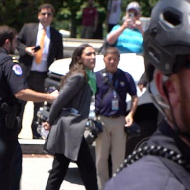 The group marched over to the high court from the Capitol, chanting "we won't go back" and "our body our choice" after the justices in a 5-4 decision overturned the 1973 Roe v. Wade decision that first legalized abortions.