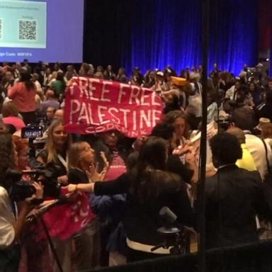 Minnesota Gov. Tim Walz's remarks Tuesday to the women's caucus at the DNC were interrupted by pro-Palestinian protesters.