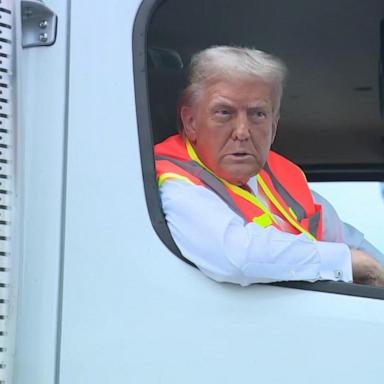 VIDEO: Trump speaks to reporters from garbage truck on campaign trail