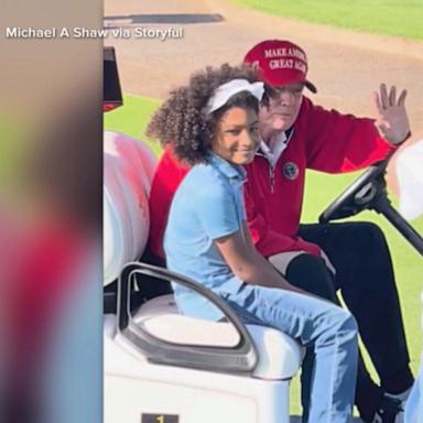 President-elect Donald Trump complimented one girl’s hair and posed for a picture with her while playing golf in West Palm Beach, Florida.