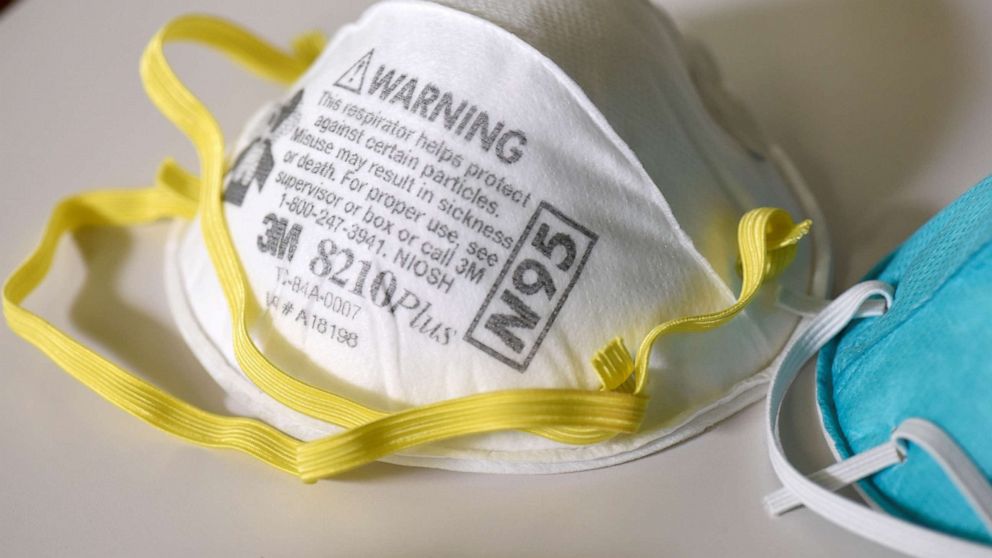 PHOTO: FILE PHOTO: Various N95 respiration masks at a laboratory of 3M, that has been contracted by the U.S. government to produce extra marks in response to the country's novel coronavirus outbreak, in Maplewood, Minn., March 4, 2020. 
